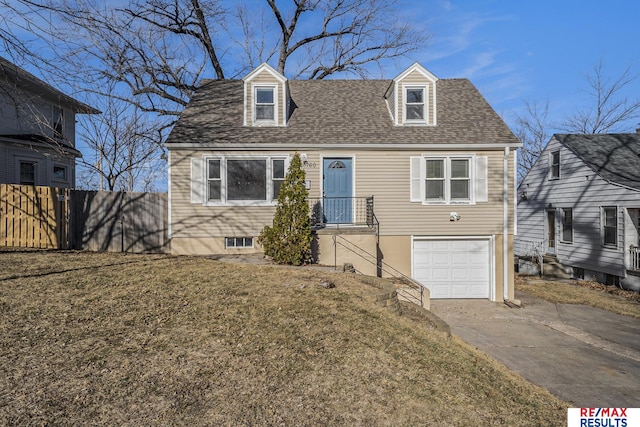 new england style home with a garage and a front lawn