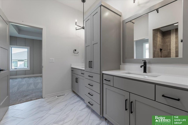 bathroom featuring vanity and walk in shower