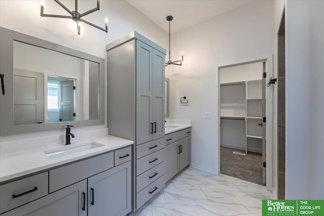 bathroom featuring vanity and ceiling fan