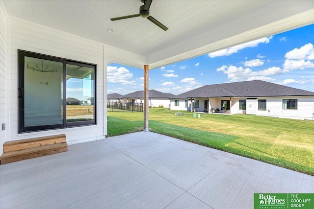 view of patio featuring ceiling fan