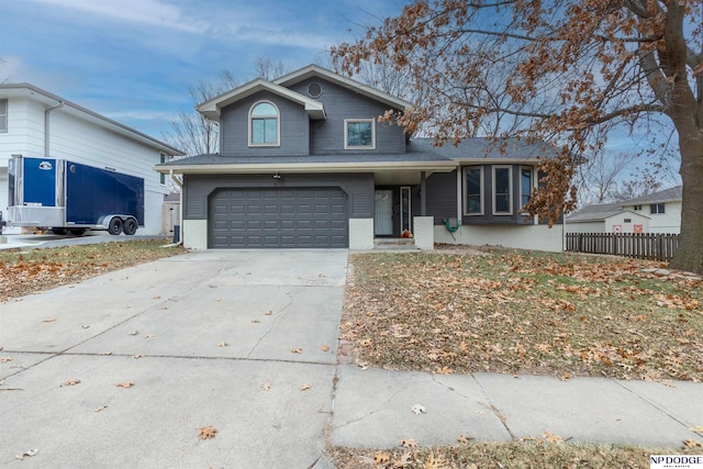 front of property with a garage