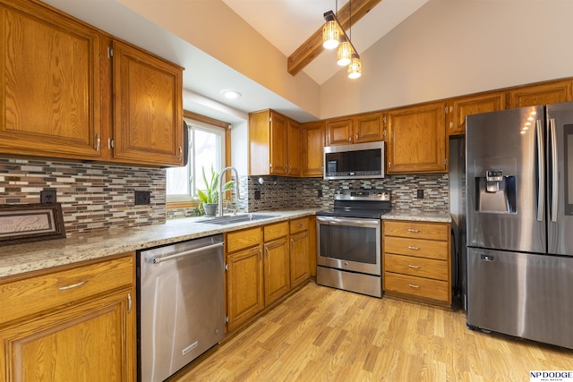 kitchen featuring tasteful backsplash, sink, stainless steel appliances, and beam ceiling