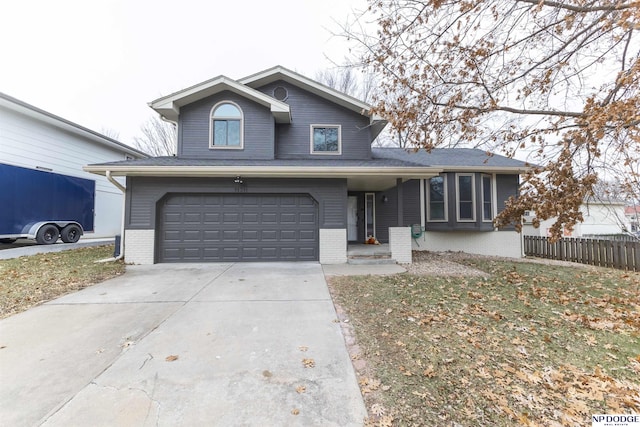 front of property with a garage