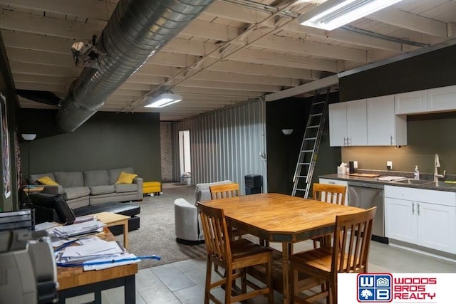 dining room featuring sink