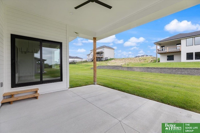 view of patio featuring ceiling fan