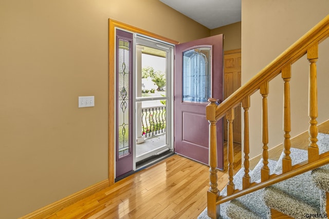 foyer entrance featuring hardwood / wood-style flooring