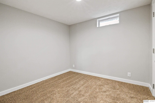 view of carpeted spare room