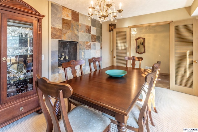 carpeted dining space with a notable chandelier