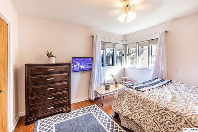 bedroom featuring ceiling fan and light hardwood / wood-style floors