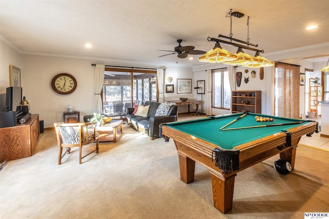 recreation room with light colored carpet, ceiling fan, ornamental molding, and pool table