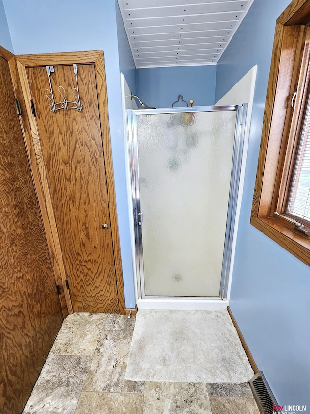 bathroom with an enclosed shower