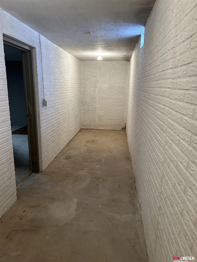 hall with concrete floors