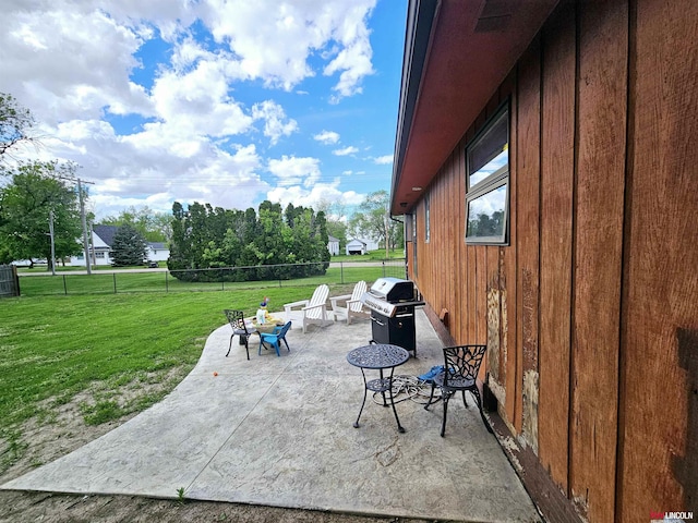 view of patio featuring a grill