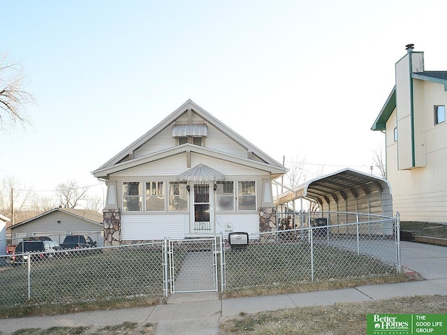 view of front of property featuring a carport