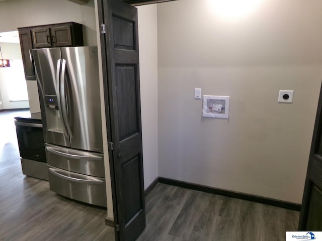 kitchen featuring dark brown cabinetry, stainless steel fridge with ice dispenser, and dark hardwood / wood-style flooring