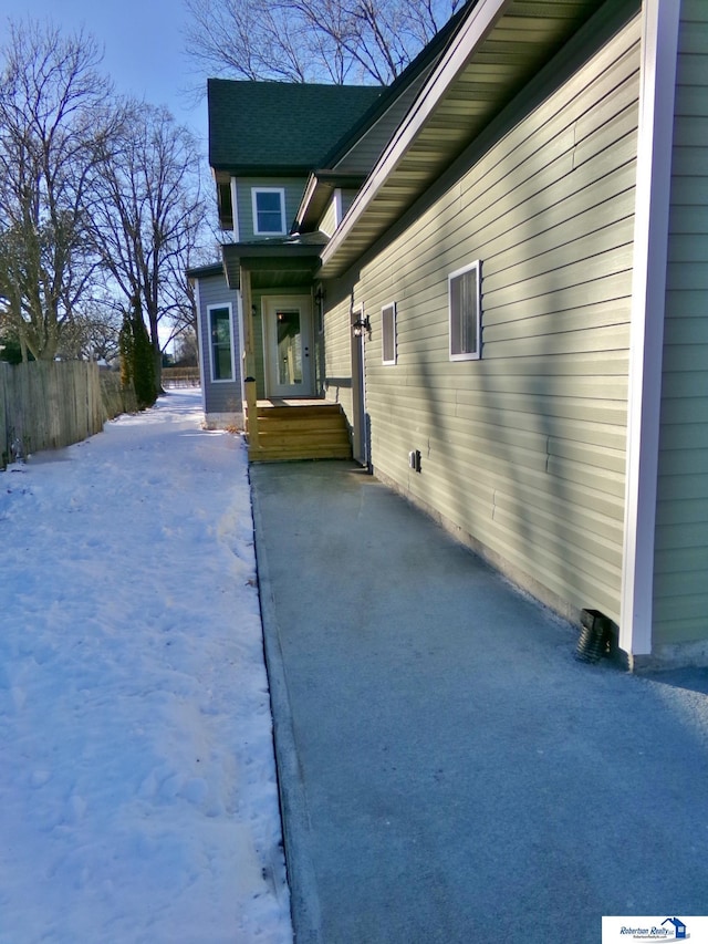 view of snow covered property