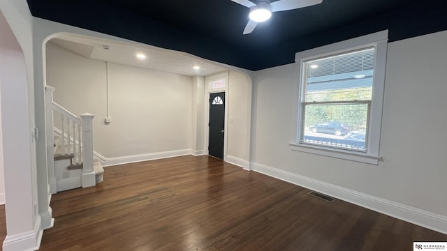 entrance foyer featuring dark hardwood / wood-style floors and ceiling fan