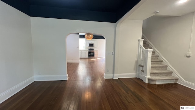 interior space with dark wood-type flooring