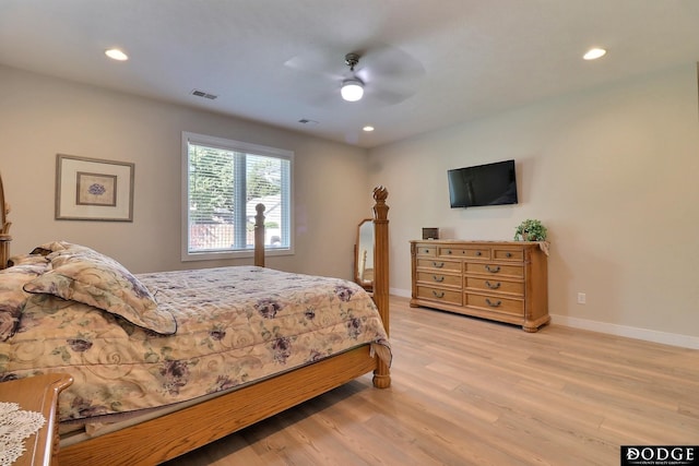 bedroom featuring ceiling fan and light wood-type flooring