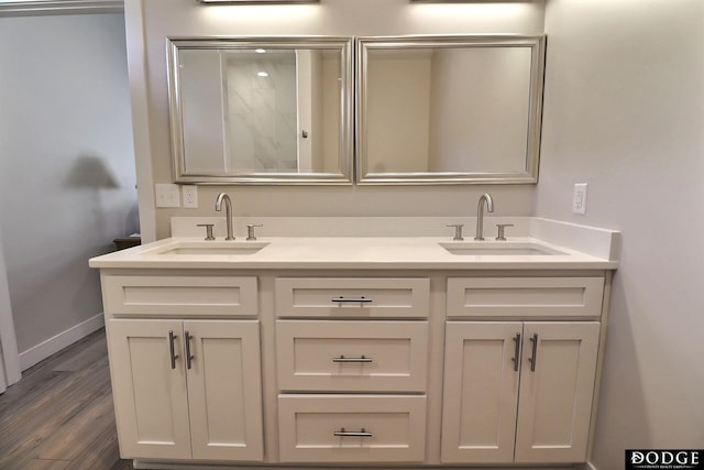 bathroom featuring hardwood / wood-style floors and vanity