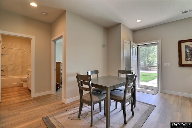 dining area with light wood-type flooring