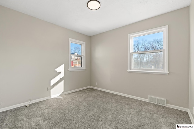 empty room with carpet floors