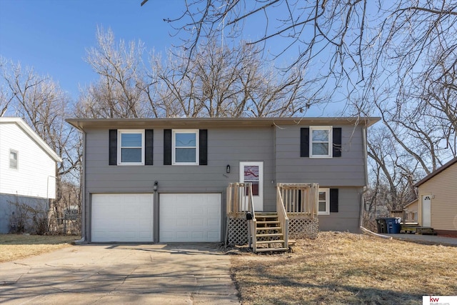 raised ranch featuring a garage