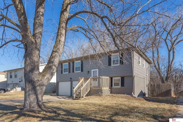 split foyer home featuring a garage