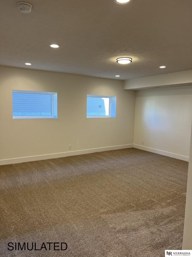 empty room with carpet flooring