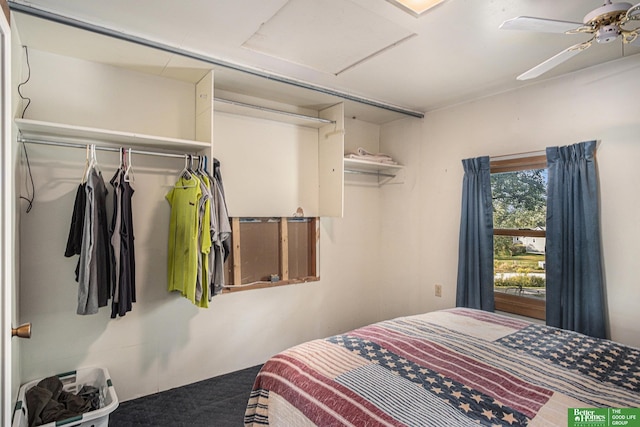 bedroom featuring ceiling fan and a closet