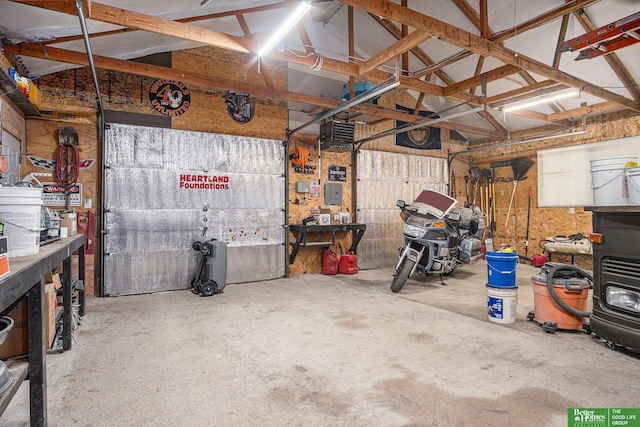 garage with a workshop area