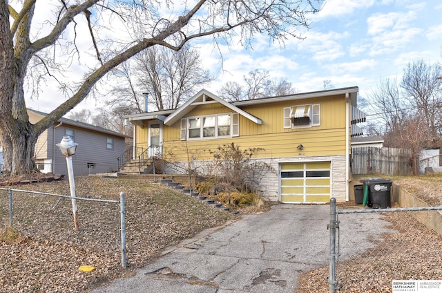 view of front of property with a garage