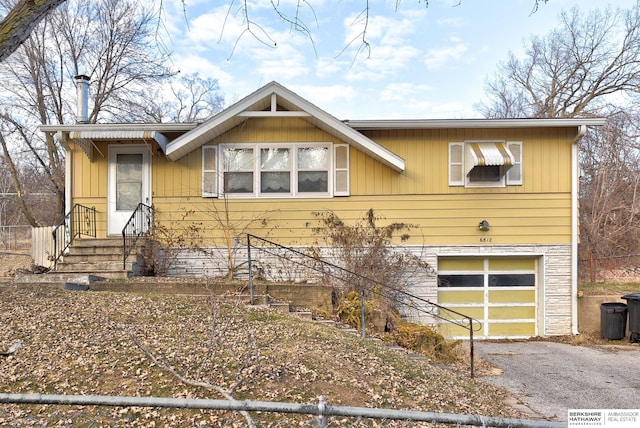 view of front of house with a garage