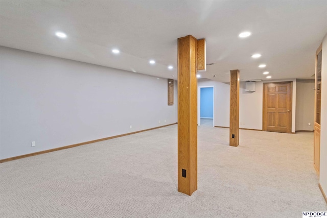 basement with light colored carpet