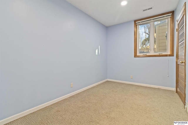 view of carpeted spare room