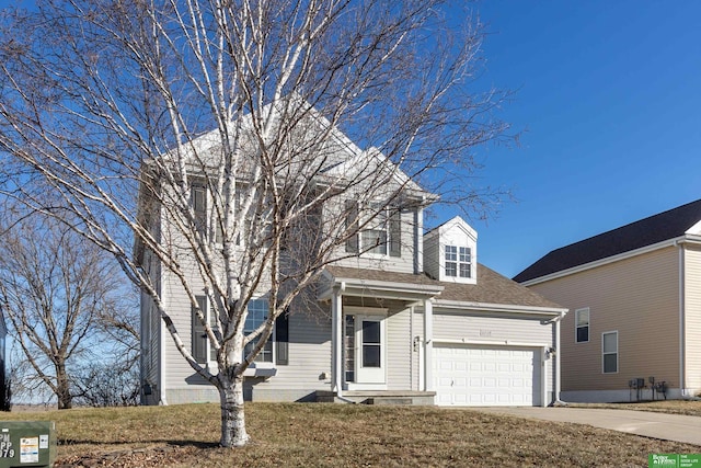 view of front of property featuring a garage