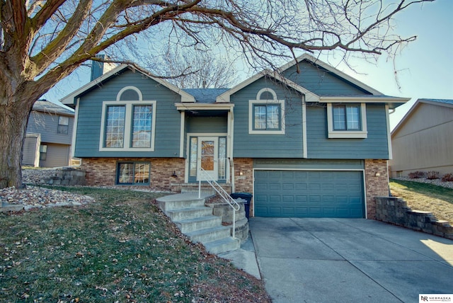 raised ranch with a garage