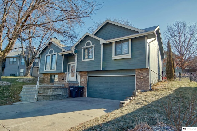 split foyer home featuring a garage