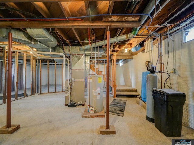 basement featuring electric water heater and heating unit