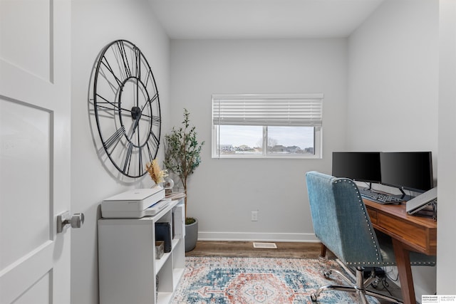 office space featuring wood-type flooring