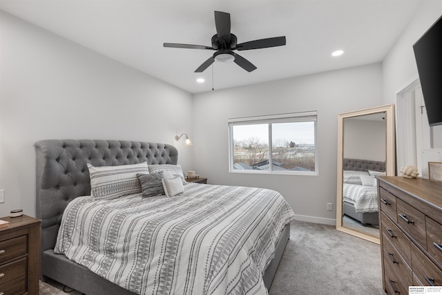 carpeted bedroom with ceiling fan