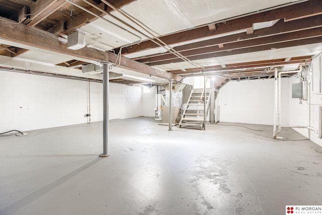 basement featuring water heater