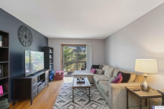 living room with light hardwood / wood-style flooring