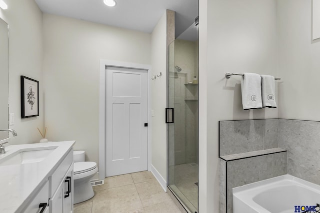 full bathroom with vanity, shower with separate bathtub, tile patterned flooring, and toilet