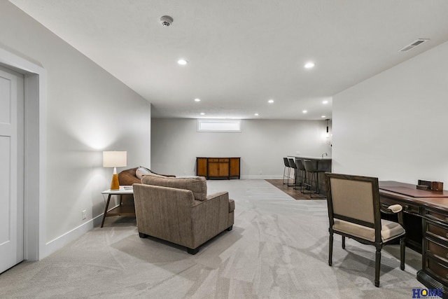 living room with light colored carpet