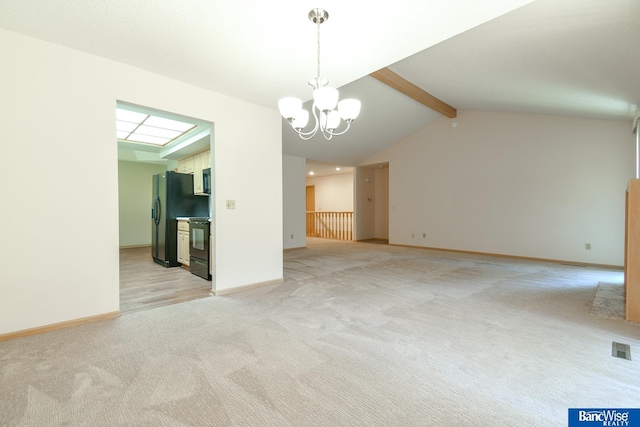 carpeted empty room featuring an inviting chandelier and lofted ceiling with beams