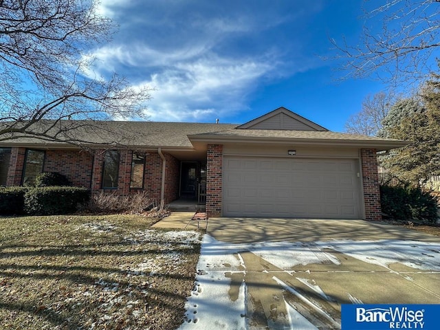 ranch-style home with a garage