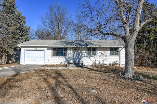 ranch-style home with a garage