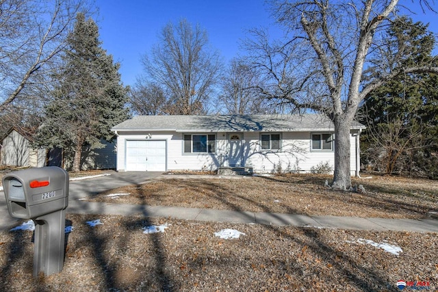 ranch-style home with a garage