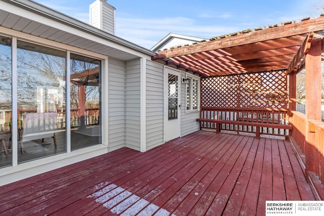 wooden terrace featuring a pergola